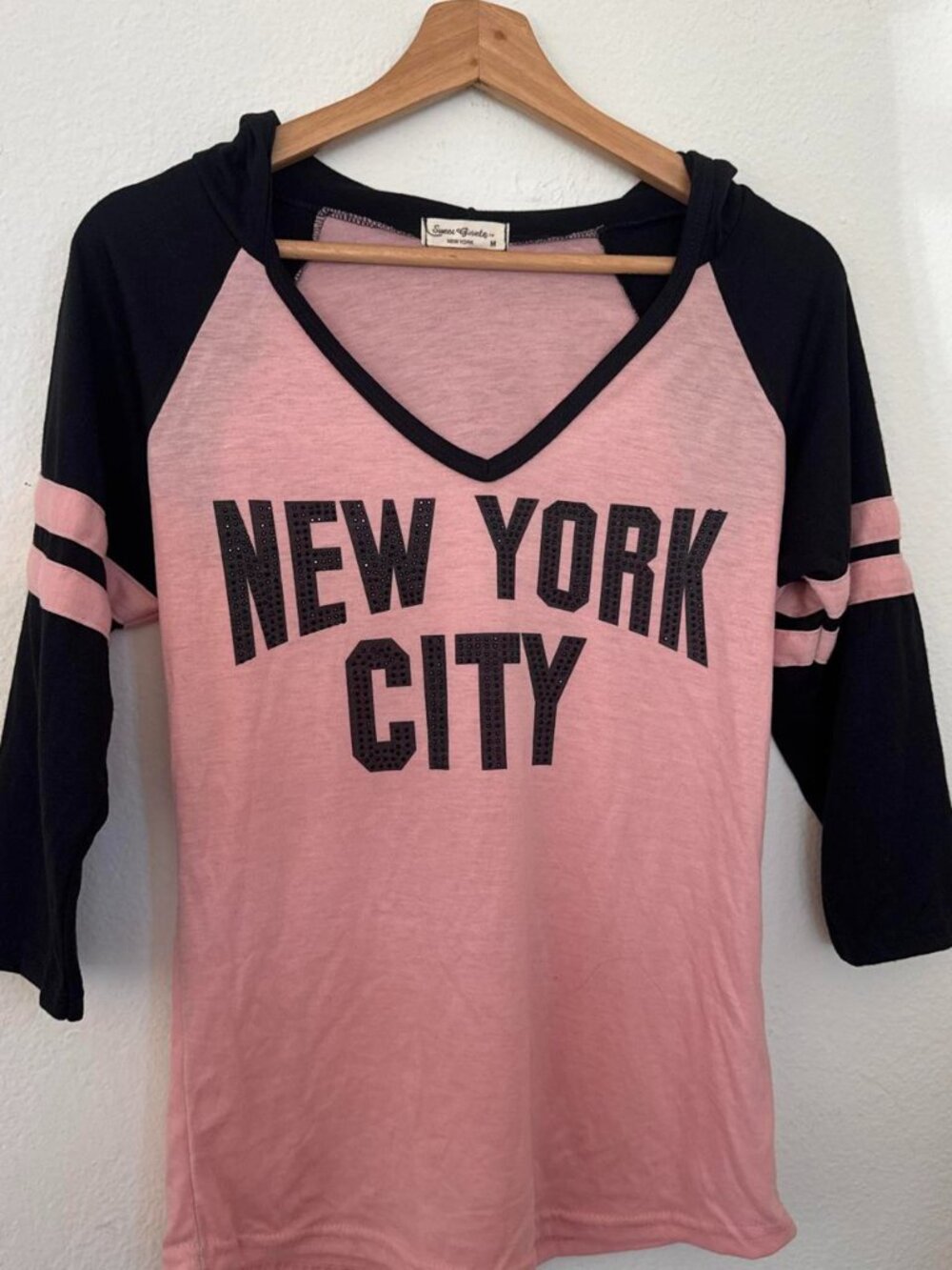 Sweet Gisele New York City pink & black baseball tee with black text reading